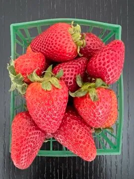 A punnet of fresh strawberries